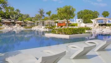 2 outdoor pools, open 9:00 AM to 6:00 PM, free cabanas, pool umbrellas