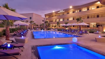 Outdoor pool, open 6:00 AM to 6:00 PM, pool umbrellas, sun loungers
