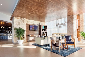 Hotel entrance and lobby at Fairfield Inn & Suites by Marriott Cancun Airport