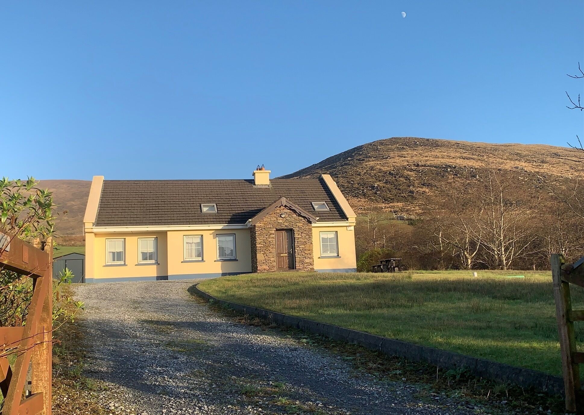 House photo under the moon