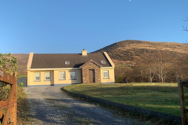 House photo under the moon