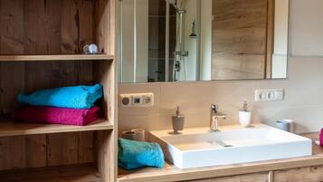 Bathtub, hair dryer, towels, soap