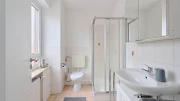 Shower, hair dryer, toilet paper