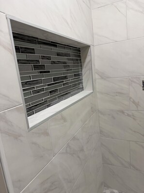 Combined shower/tub, hair dryer, towels, soap