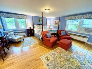 Master king bedroom with chaise lounge, chairs, lots of closets and space.