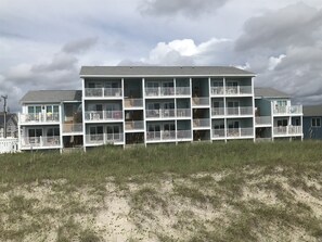 Exterior - CORAL SURF C-1 OCEANFRONT 2 BR & 2 BTH.  PRIVATE 240V EV CHARGER & 110V OUTLET (Carolina Beach)