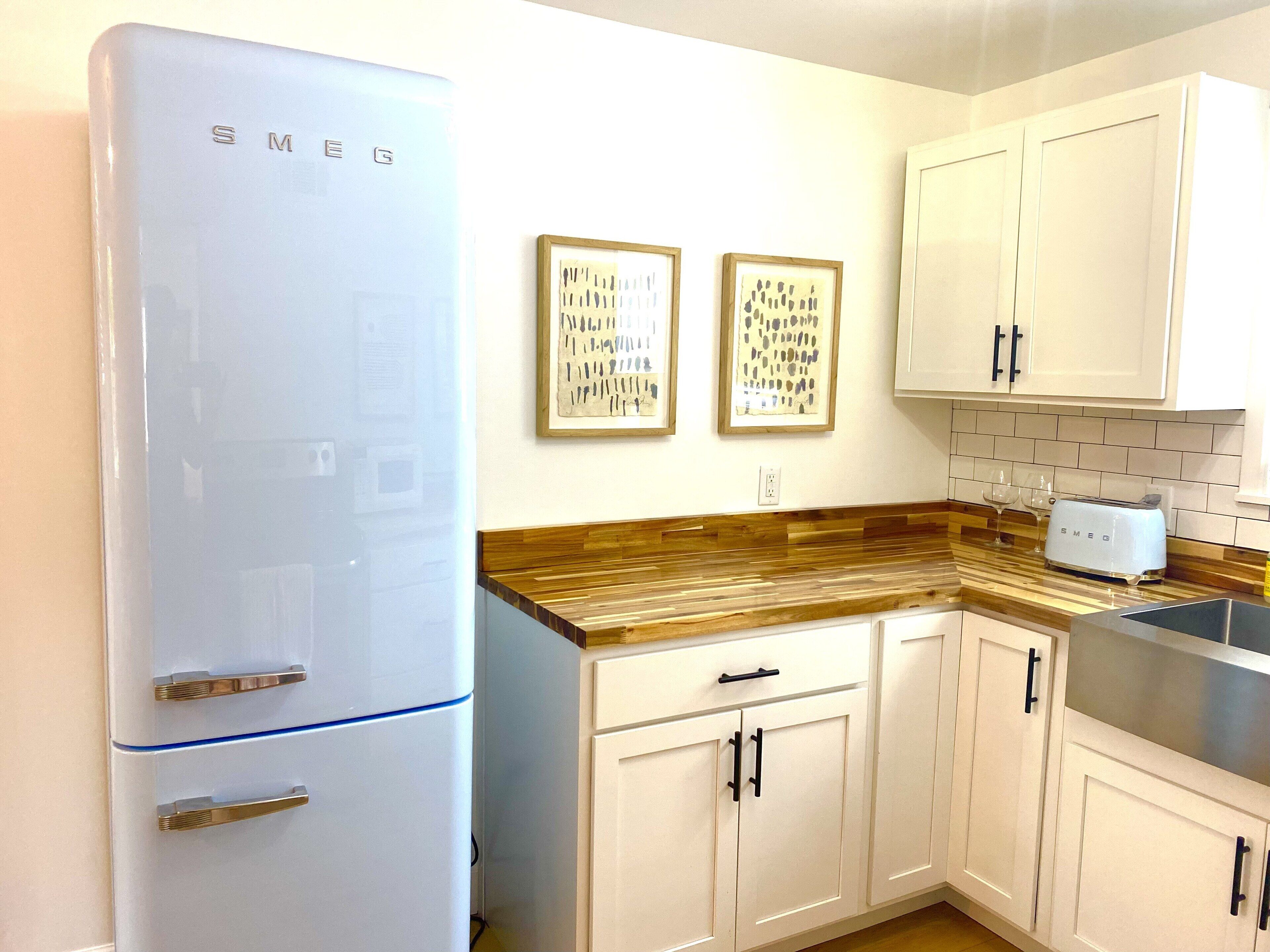 Experience History in an original Carriage House located behind a Colonial home.