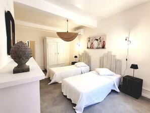 3 slaapkamers, een strijkplank/strijkijzer, gratis wifi