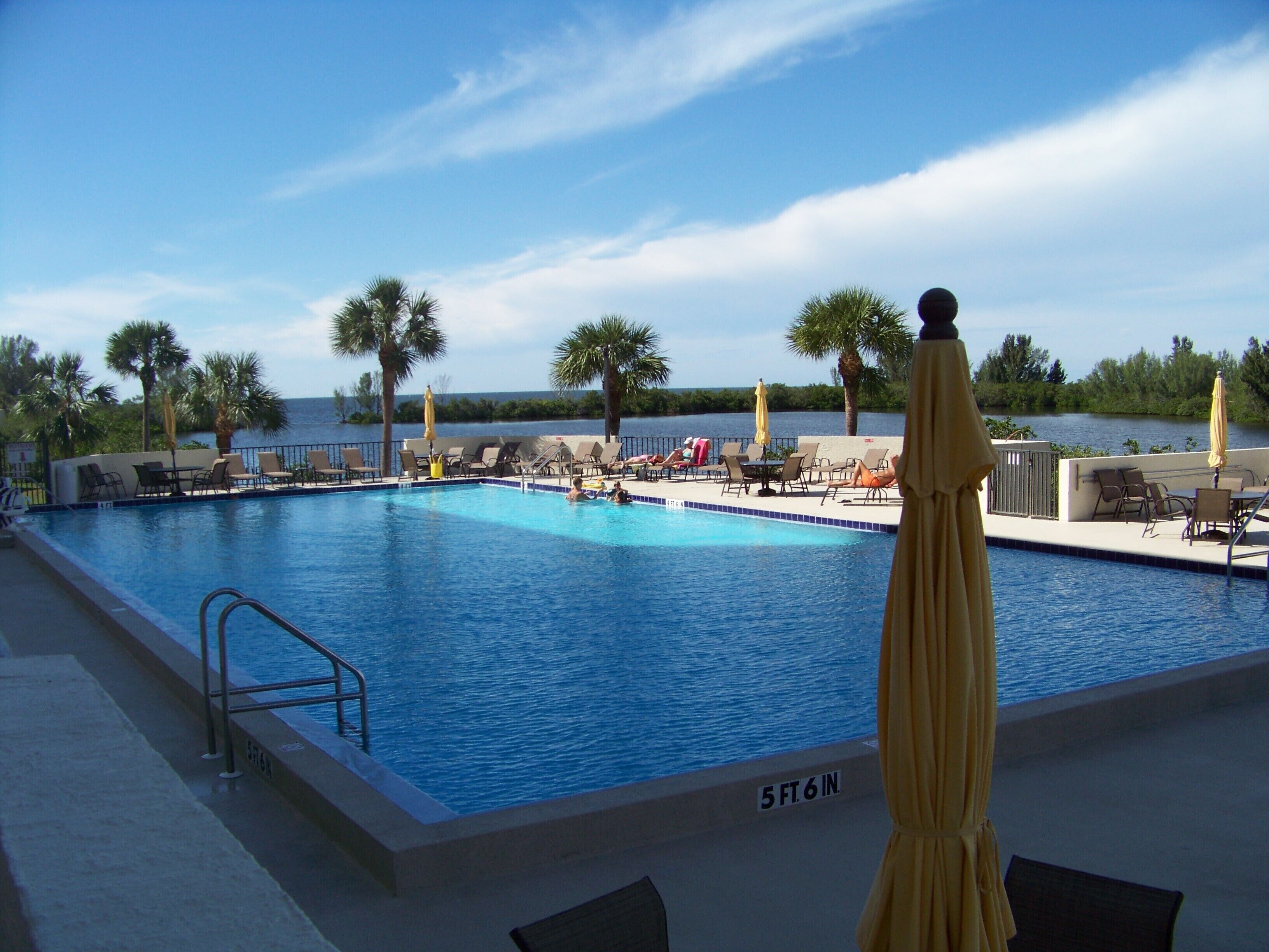 Large Swimming Pool w/lots of Deck Area overlooking the Gulf.