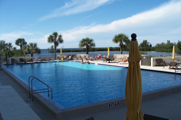 Large Swimming Pool w/lots of Deck Area overlooking the Gulf.