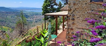 Cozy stone house in the green, sea-lake view, garden, air cond. WIFI, washer