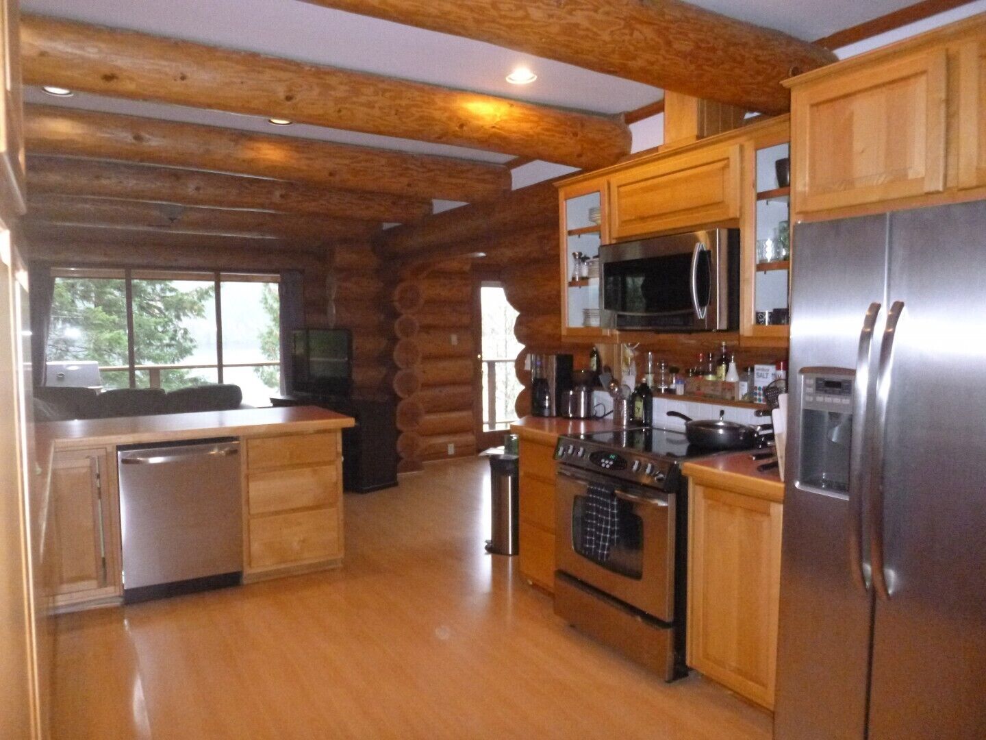 Tranquilize at Spectacular Sproat Lakefront Waterfront Authentic Timber Log Home