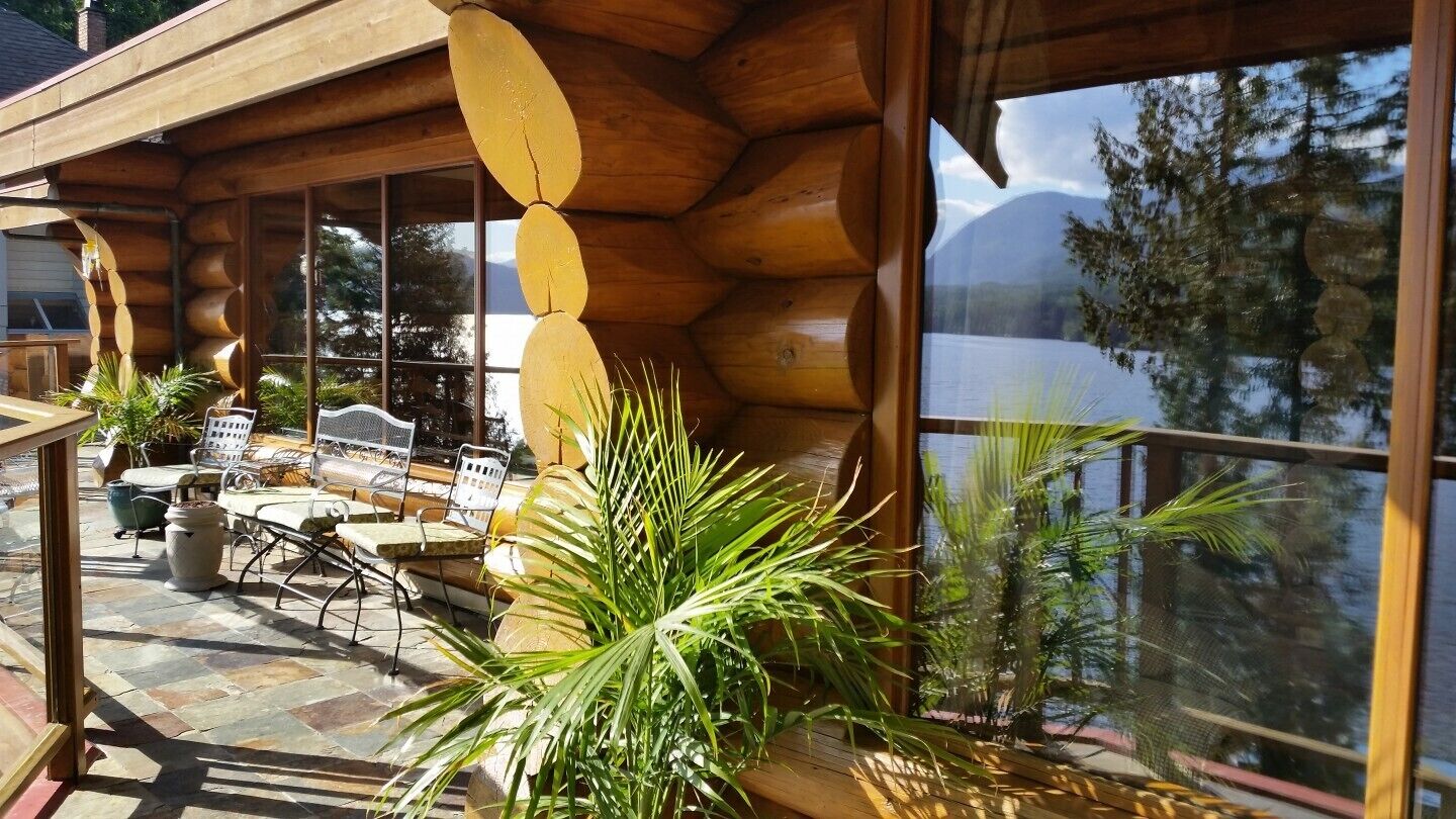 Tranquilize at Spectacular Sproat Lakefront Waterfront Authentic Timber Log Home