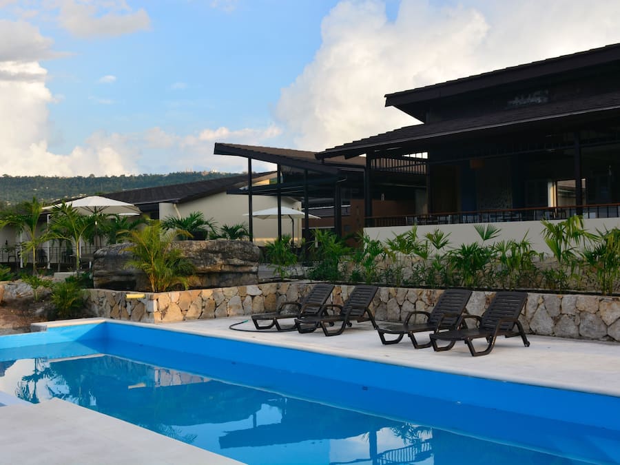 Outdoor pool, open 8:00 AM to 7:00 PM, pool loungers
