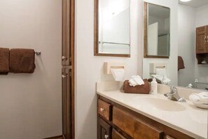 Shower, hair dryer, towels, soap