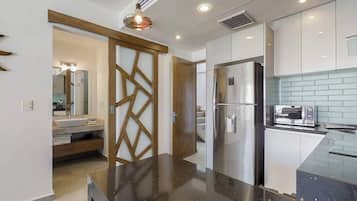 Fridge, microwave, stovetop, coffee/tea maker