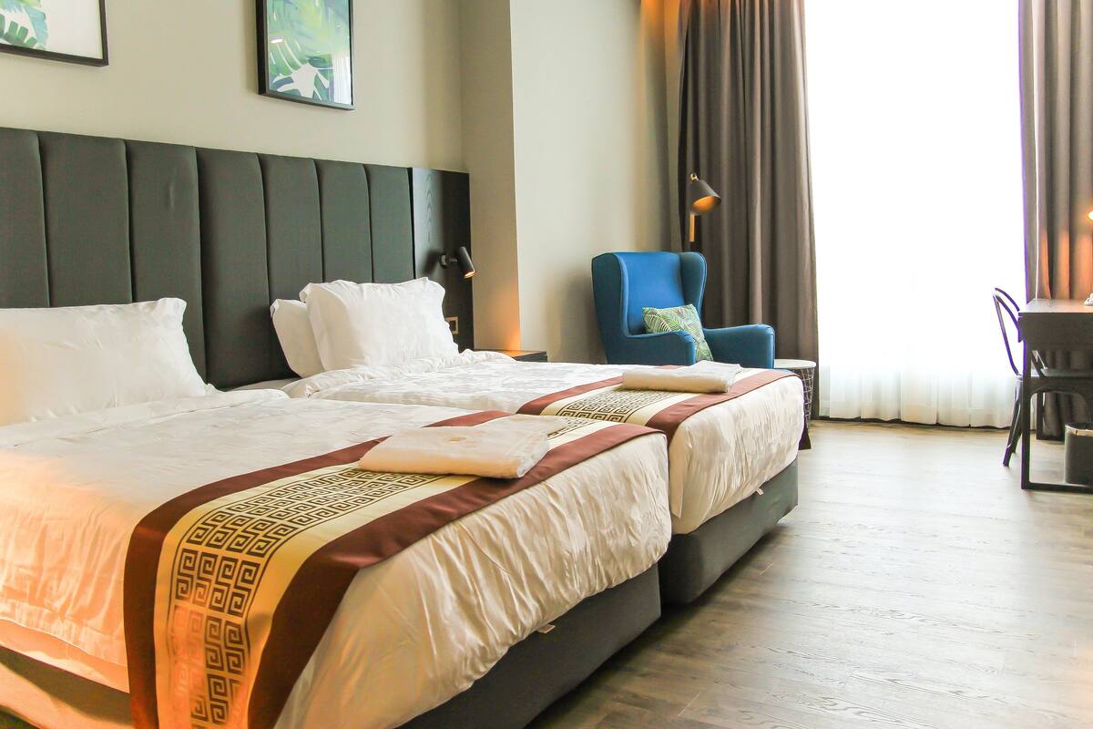 Premium bedding, down comforters, minibar, desk