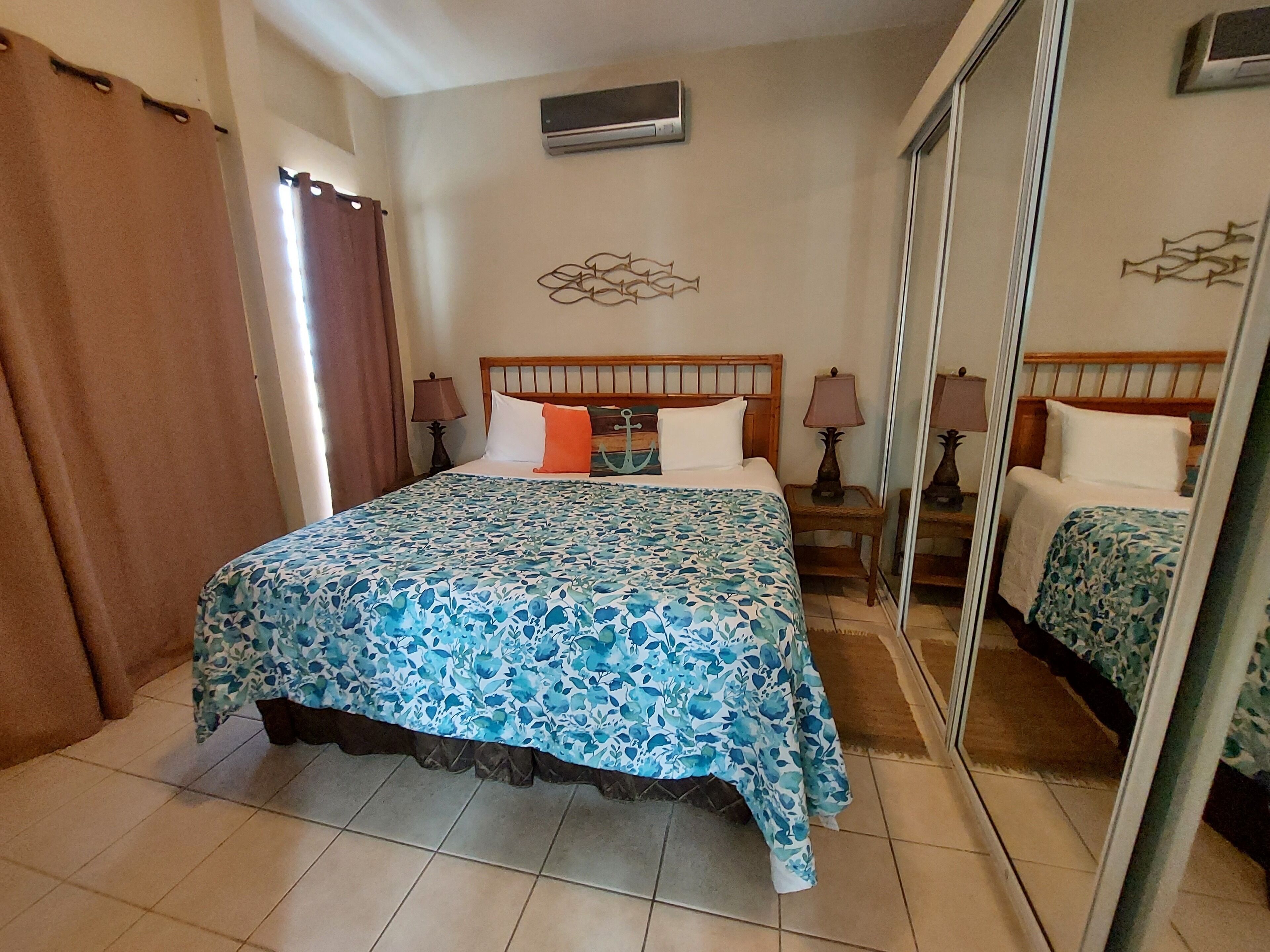 1 bedroom, desk, iron/ironing board, travel crib