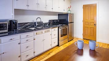 Fridge, microwave, oven, cookware/dishes/utensils