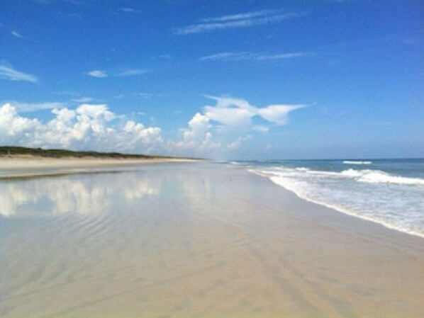 On the beach, sun loungers, beach towels