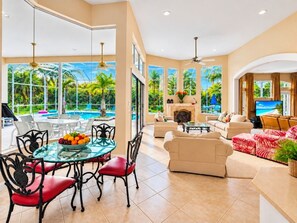 View from Kitchen looking out towards livingroom with fireplace.Breakfast nook, TV room. - Private h. pool & hot tub, one floor, sleeps 2 to 8 Pets ok New Smyrna Beach, FL (NEW SMYRNA BEACH)