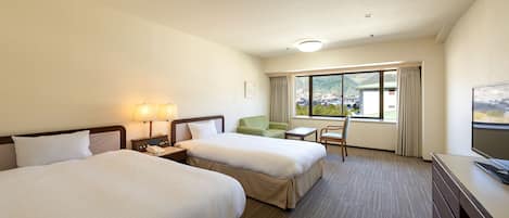 Desk, laptop workspace, blackout curtains, free WiFi