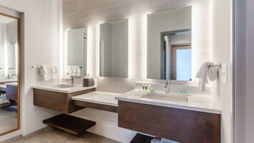 Suite, 1 King Bed | Bathroom | Hair dryer, towels, soap, shampoo