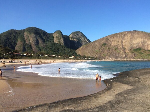Guests can enjoy the beach and surrounding mountains.