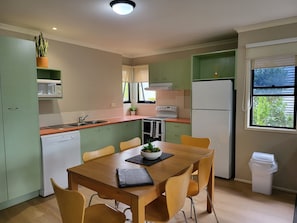 Apartment 1 | Private kitchen | Full-sized fridge, microwave, electric kettle, toaster