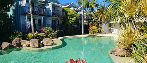 3 outdoor pools, a heated pool, open 7:00 AM to 9:00 PM, pool umbrellas