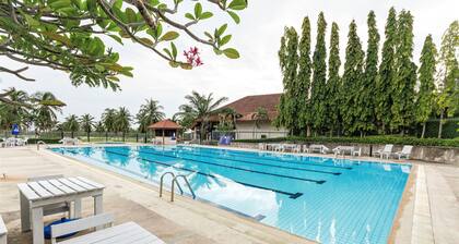 Seastar Service Apartment, Haus & Hotel mit Blick auf Golfplatz