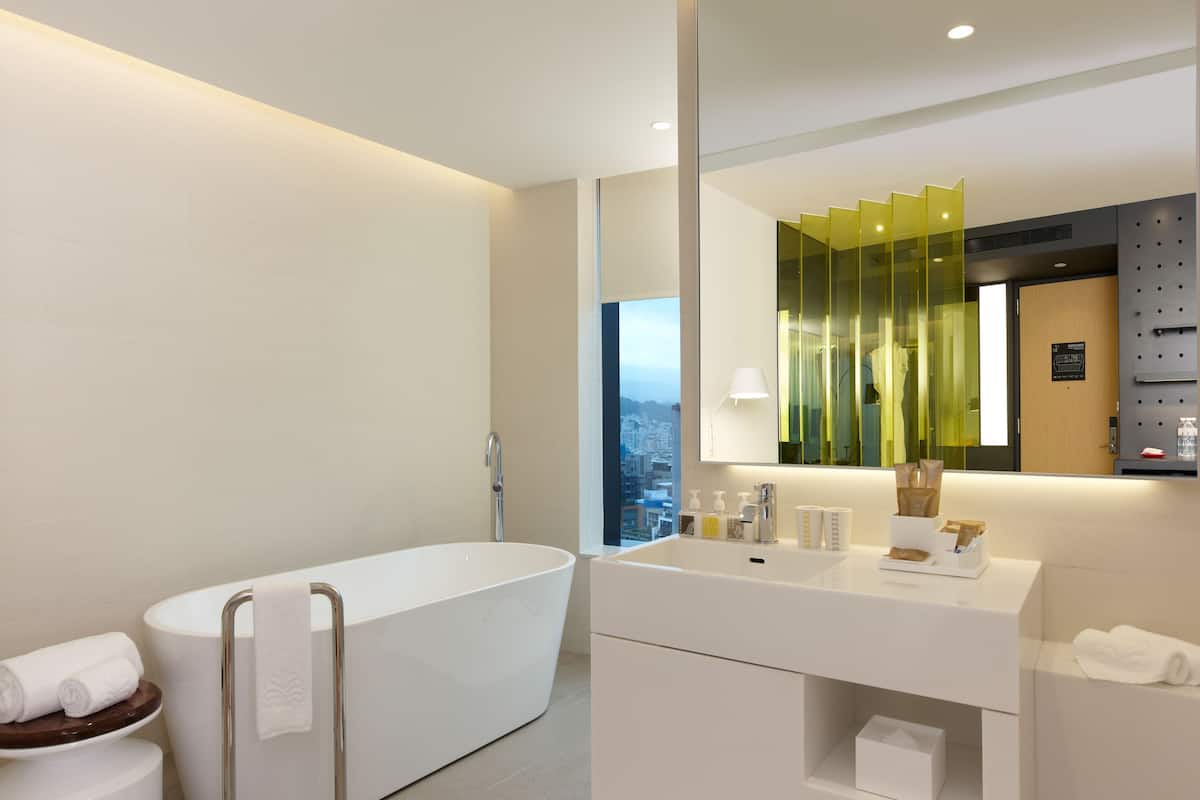 deluxe room | bathroom | shower, hydromassage showerhead, hair dryer, electronic bidet