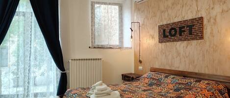 Suíte estúdio básica | Roupas de cama premium, edredons de pluma, frigobar