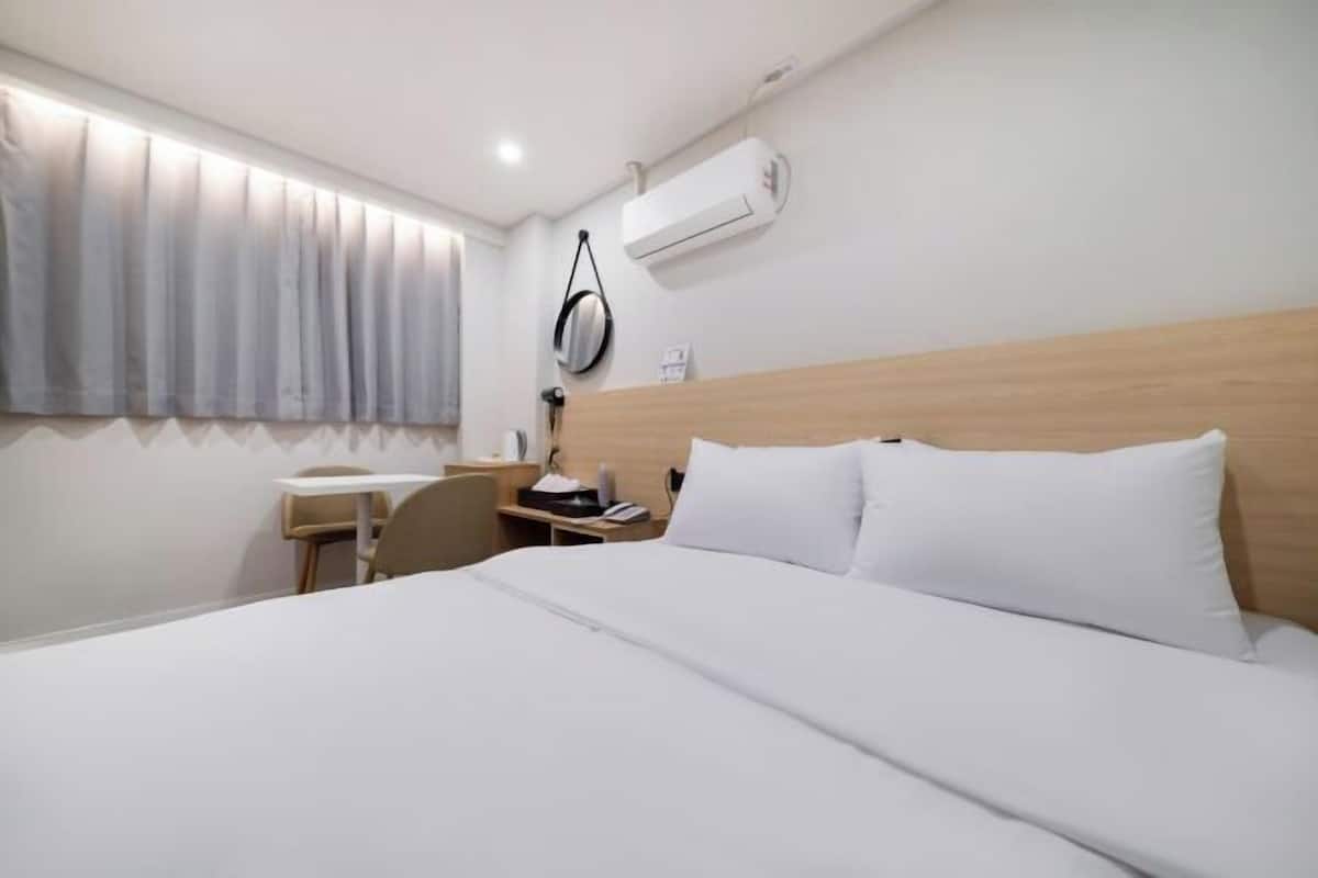 Down comforters, memory foam beds, desk, laptop workspace