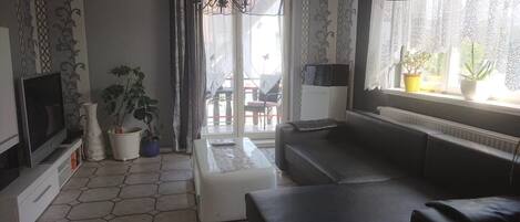 Apartment, Balcony | Living area | Flat-screen TV