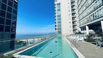 Seasonal outdoor pool, open 10:00 AM to 7:00 PM, sun loungers