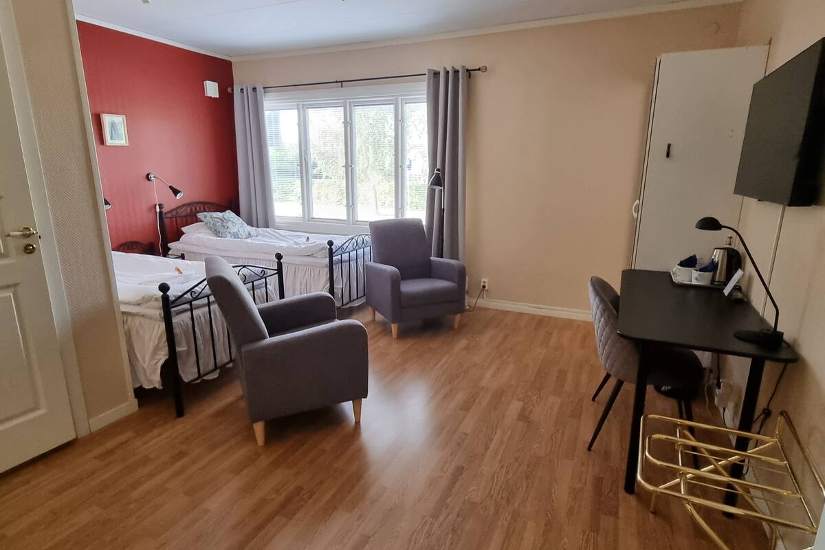 basic twin room | hypo-allergenic bedding, desk, laptop workspace, blackout curtains