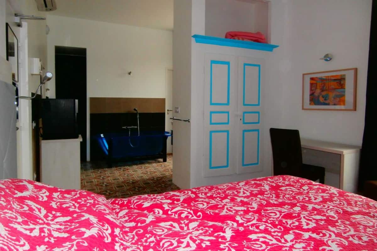 Individually decorated, individually furnished, desk, blackout drapes
