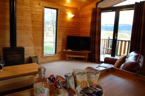 Deluxe Cabin, 4 Bedrooms (Oak Lodge) | Living area | 40-inch flat-screen TV with cable channels, TV, DVD player - Killin Log Cabins (Killin)