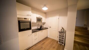 公寓, 1 間臥室, 露台 | 私人廚房 | 大型雪櫃/冰箱、微波爐、焗爐、爐具