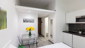 City Studio | Living area | Flat-screen TV