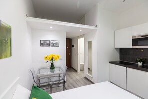 City Studio | Living area | Flat-screen TV