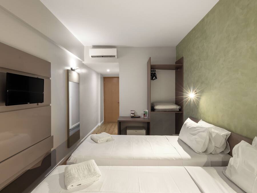 Habitación individual estándar | Minibar, espacio para trabajar con laptop, wifi gratis y ropa de cama