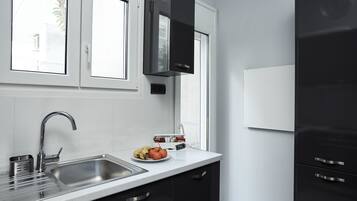 Basic Apartment, 1 Bedroom | Private kitchen | Full-sized fridge, microwave, oven, stovetop