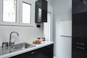 Basic Apartment, 1 Bedroom | Private kitchen | Full-size fridge, microwave, oven, stovetop