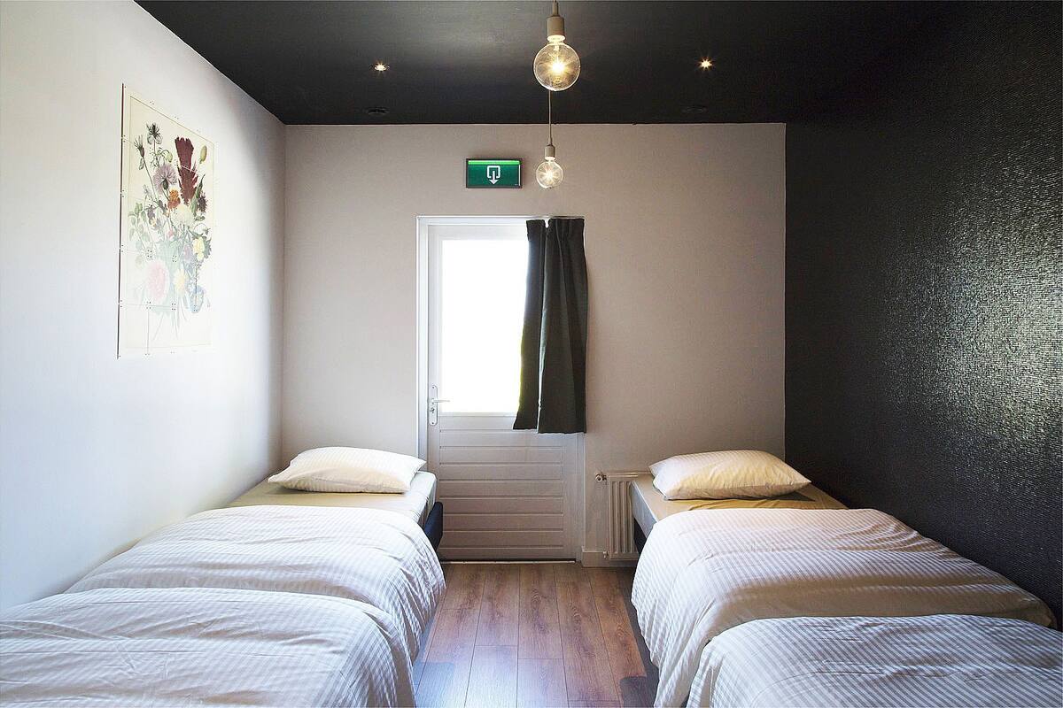 Traditional Quadruple Room, Mixed Dorm | Blackout curtains, soundproofing, free WiFi, bed sheets
