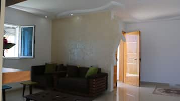 Deluxe Villa, 3 Bedrooms | Living room | 44-inch LED TV with satellite channels, TV