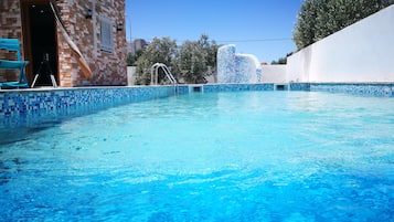 Outdoor pool, pool umbrellas, pool loungers