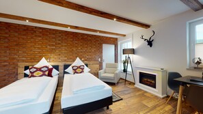 Habitación exclusiva con 1 cama doble o 2 individuales | Ropa de cama de alta calidad y minibar con artículos gratuitos