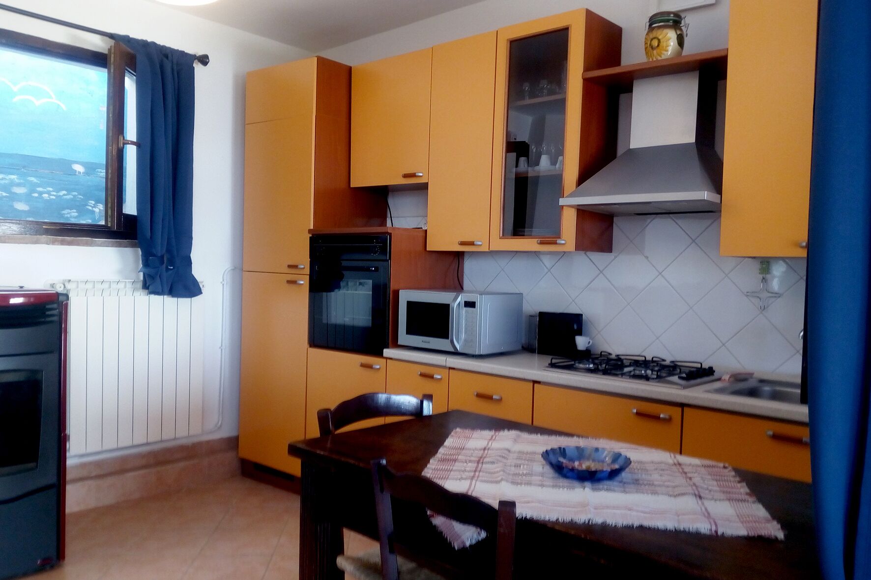 Private house with porch and garden, just steps from the beach